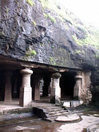 Rock wall and entrance to main cave.