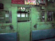 Ladies compartment in background.